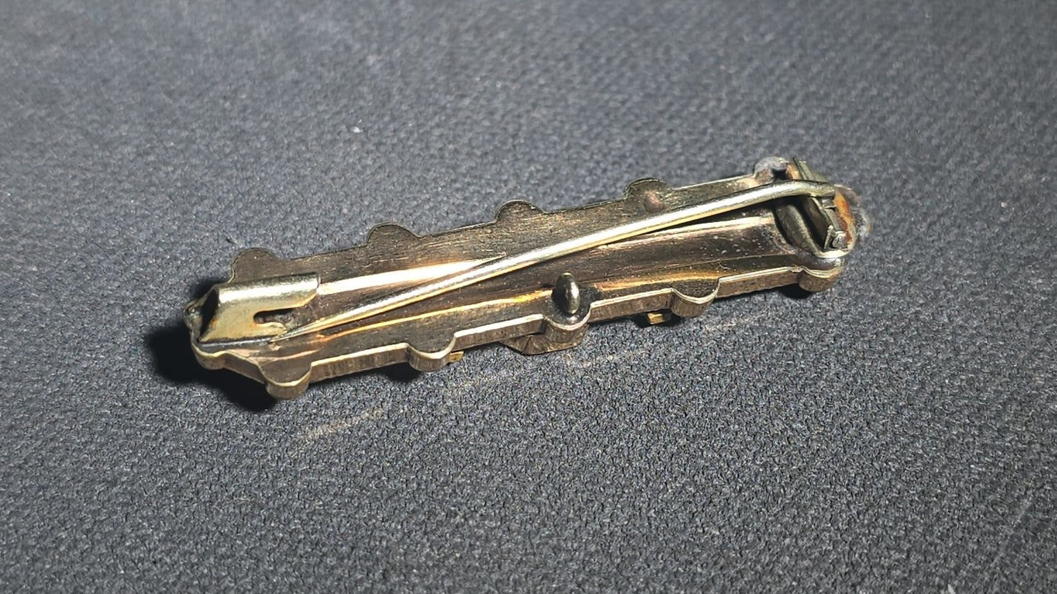 Antique Victorian Gold-Tone Bar Brooch with Black Enamel Center