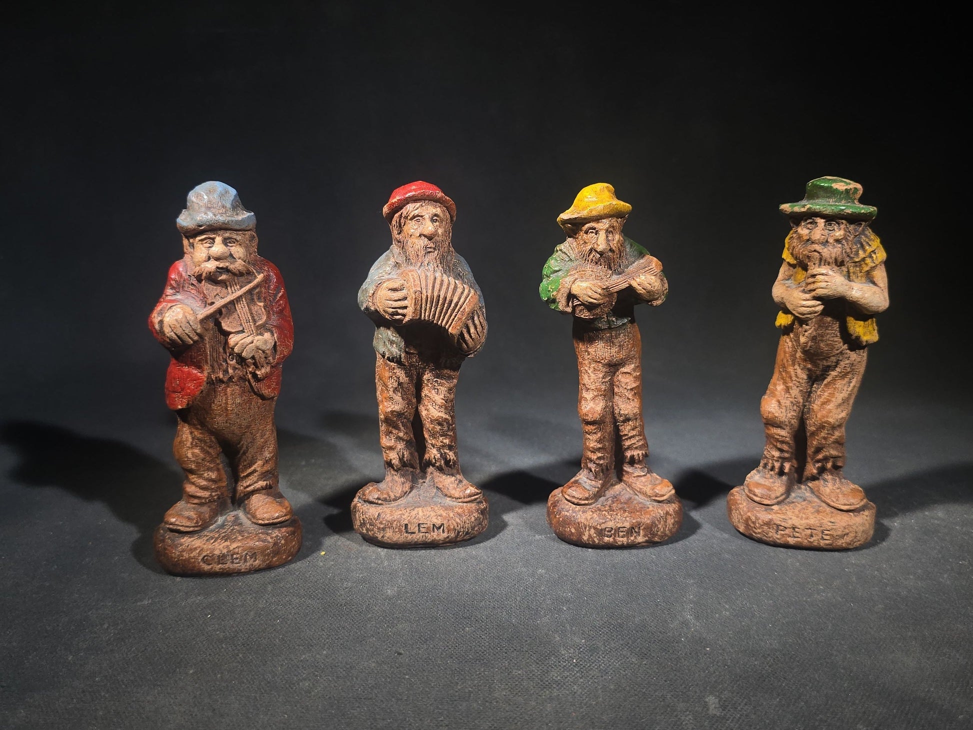 Grouping of Four Vintage Painted Hillbilly Band Musician Figurines including Clem, Lem, Ben, and Pete, Manufactured by Multi Products Inc., Chicago, Illinois, 1942