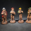 Lot 157 - Grouping of Four Vintage Painted Hillbilly Band Musician Figurines Including Clem, Lem, Ben, and Pete, Manufactured by Multi Products Inc., Chicago, Illinois, 1942, 4-1/2" H each