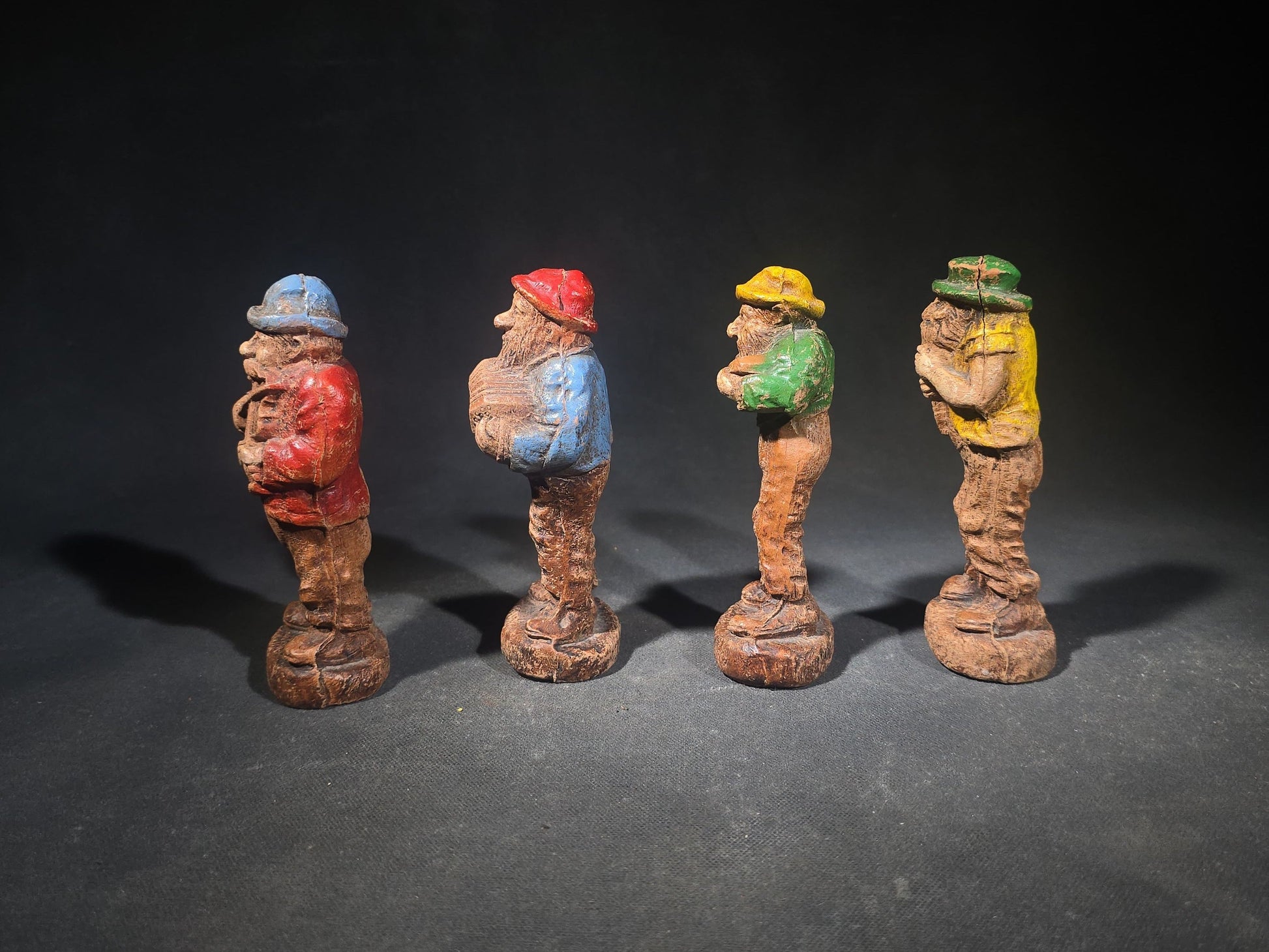 Grouping of Four Vintage Painted Hillbilly Band Musician Figurines including Clem, Lem, Ben, and Pete, Manufactured by Multi Products Inc., Chicago, Illinois, 1942