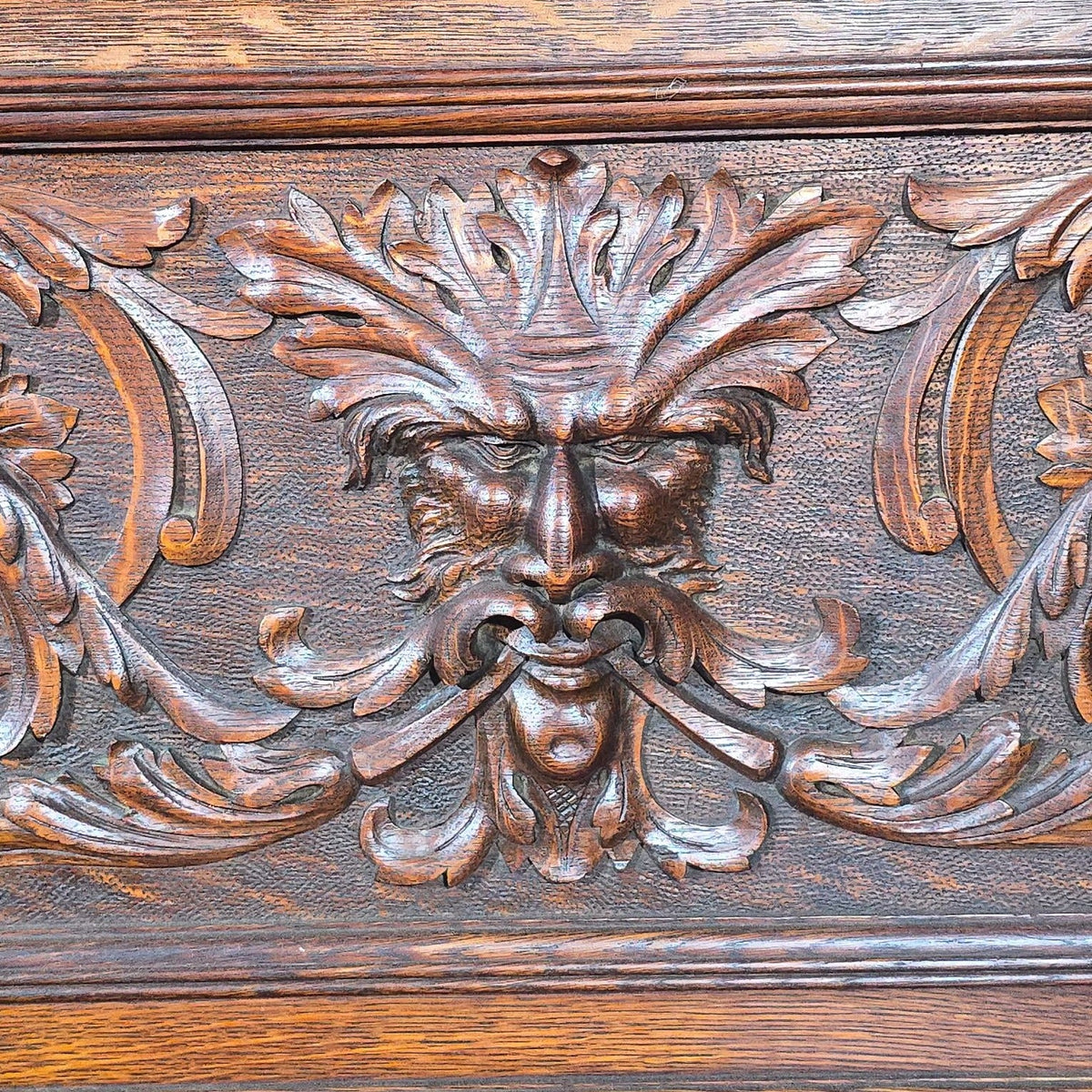 Antique Renaissance Revival Carved Oak Hall Bench with Lift-Top Storage, Green Man, Griffin and Shield Crest
