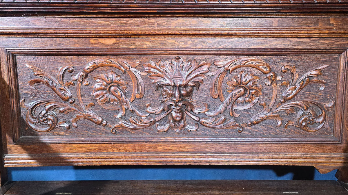 Antique Renaissance Revival Carved Oak Hall Bench with Lift-Top Storage, Green Man, Griffin and Shield Crest