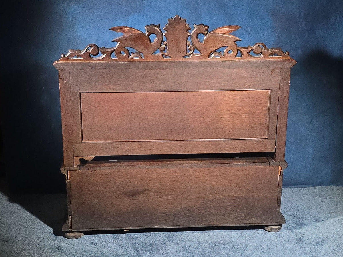 Antique Renaissance Revival Carved Oak Hall Bench with Lift-Top Storage, Green Man, Griffin and Shield Crest