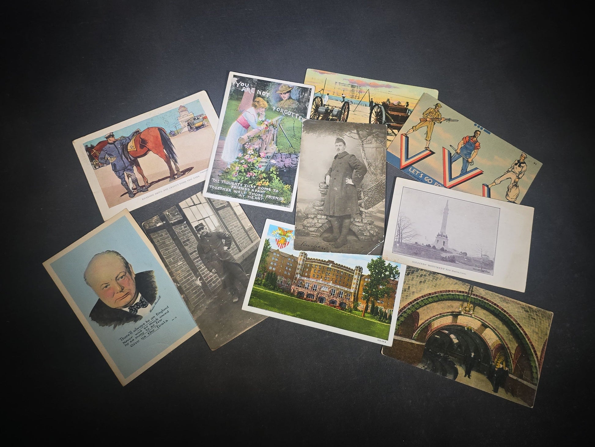 Grouping of 10 Antique and Vintage Military and Patriotic Postcards including WWI French Prisoner of War R.P.P.C. from Meschede, Germany, Winston Churchill WWII Portrait, Grant's Tomb, and City Hall Subway Station, New York