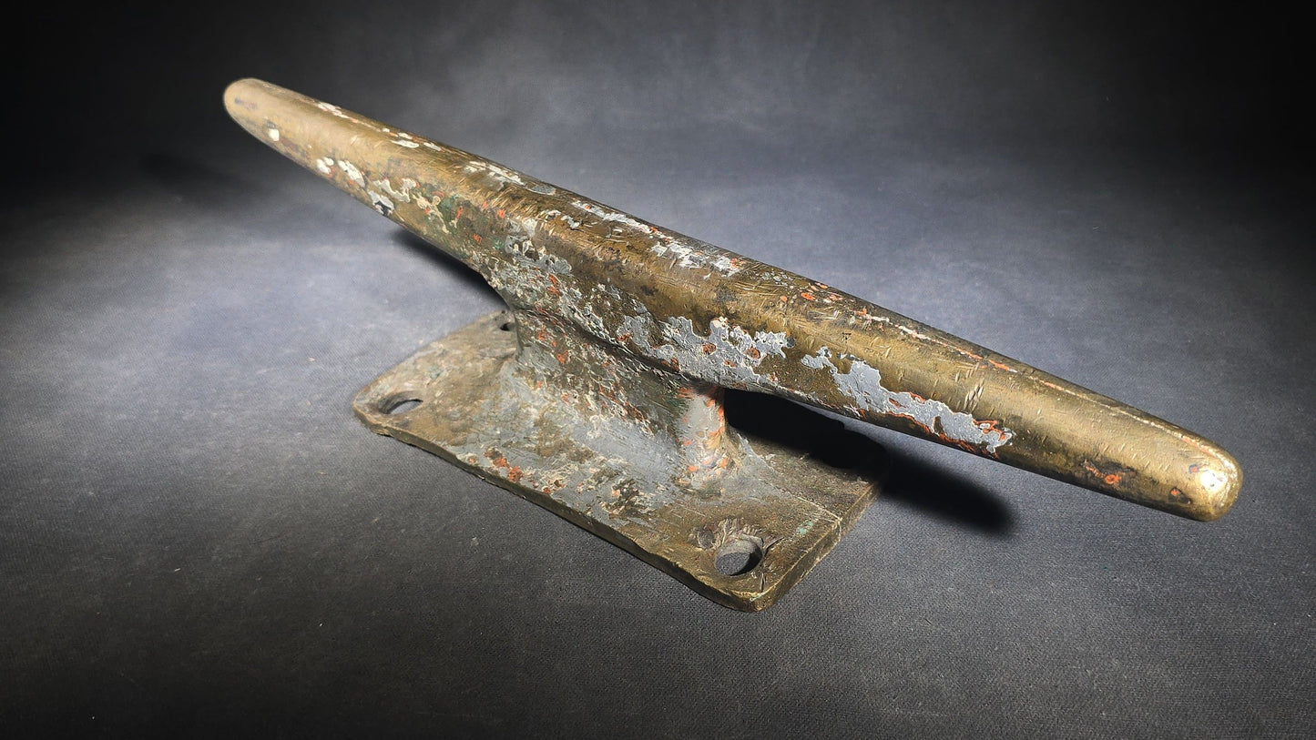 Vintage Bronze Boat Dock Cleat with Layers of Old Paint