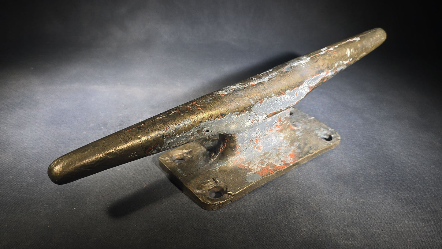 Vintage Bronze Boat Dock Cleat with Layers of Old Paint