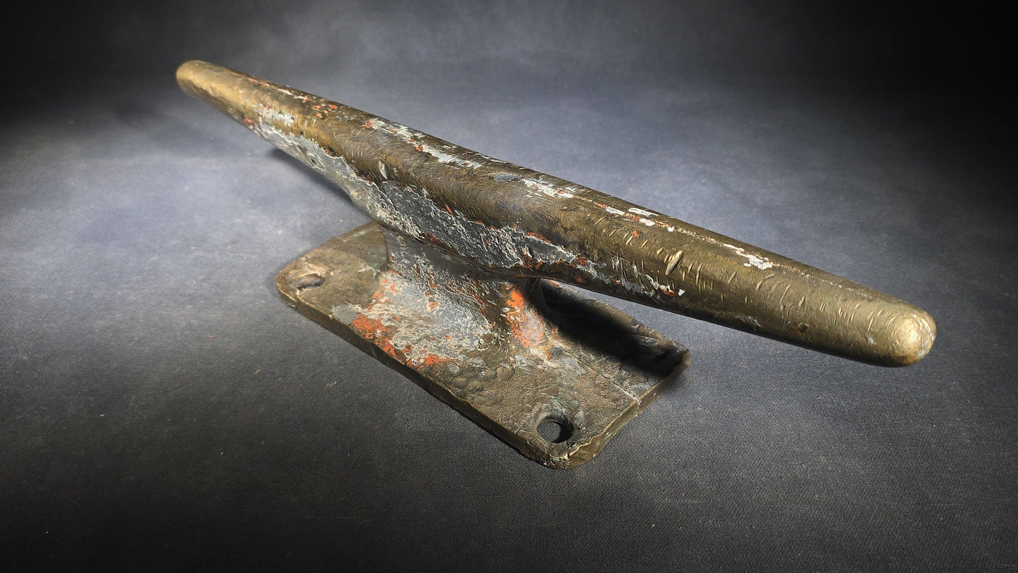 Vintage Bronze Boat Dock Cleat with Layers of Old Paint
