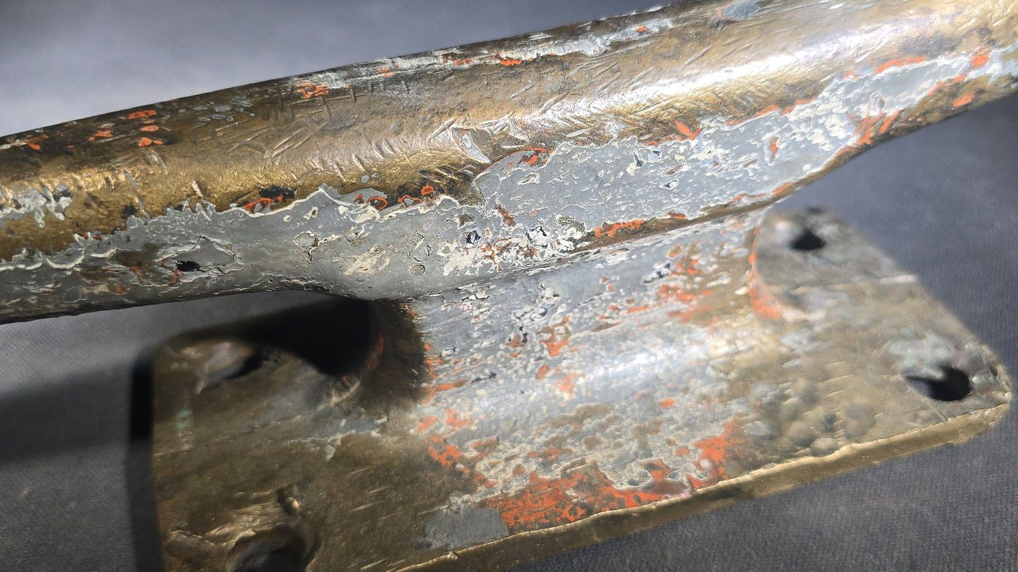 Vintage Bronze Boat Dock Cleat with Layers of Old Paint