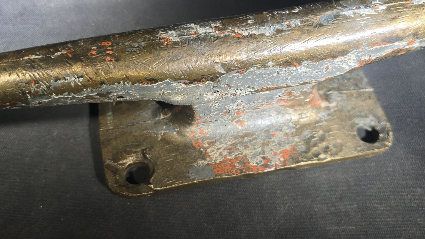 Vintage Bronze Boat Dock Cleat with Layers of Old Paint
