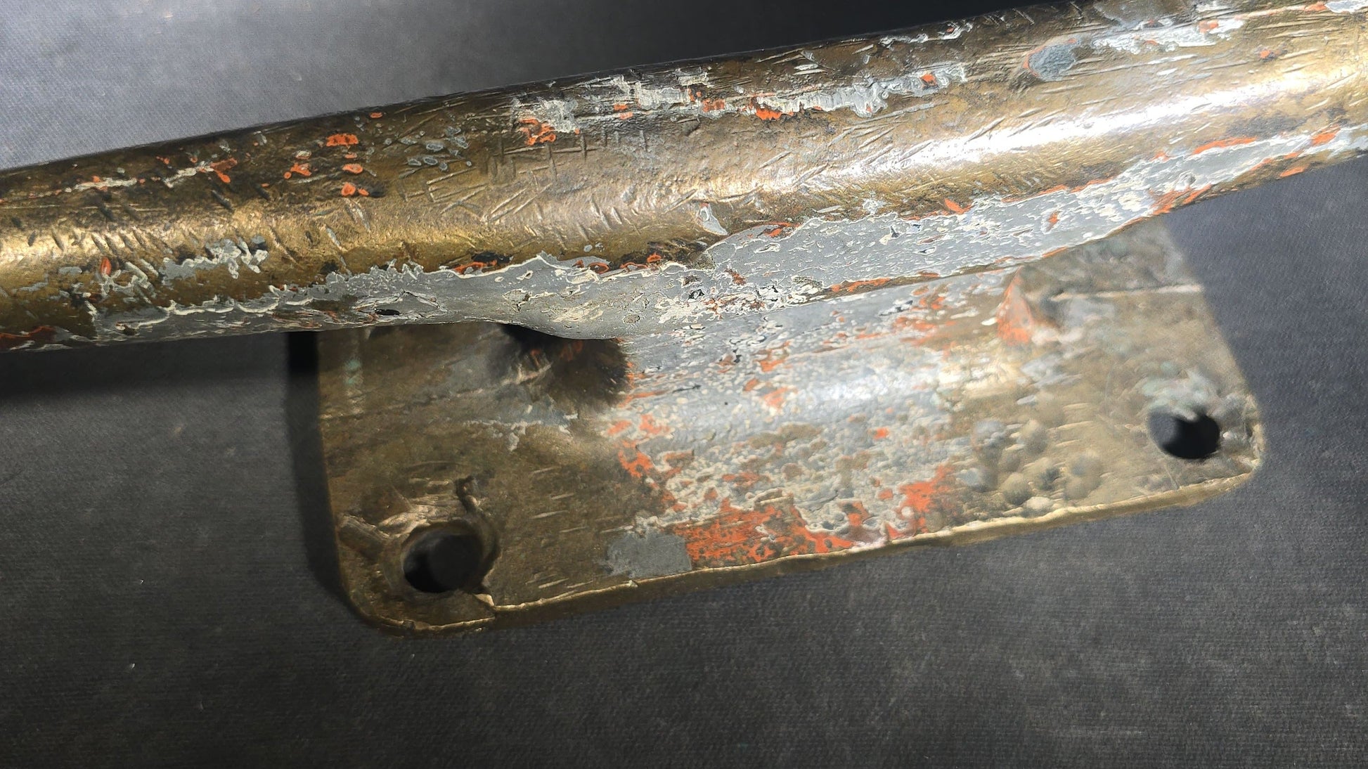 Vintage Bronze Boat Dock Cleat with Layers of Old Paint