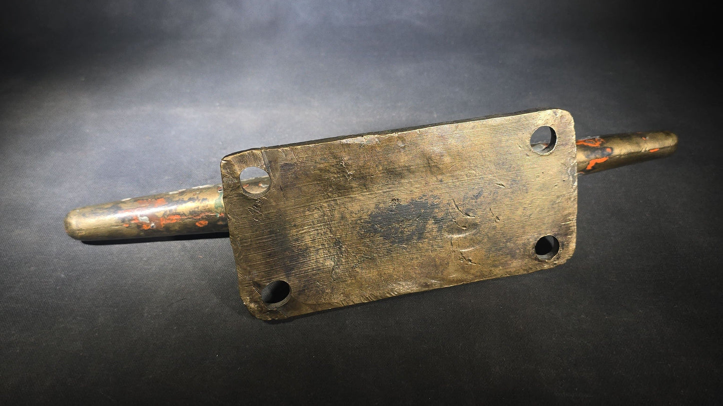 Vintage Bronze Boat Dock Cleat with Layers of Old Paint