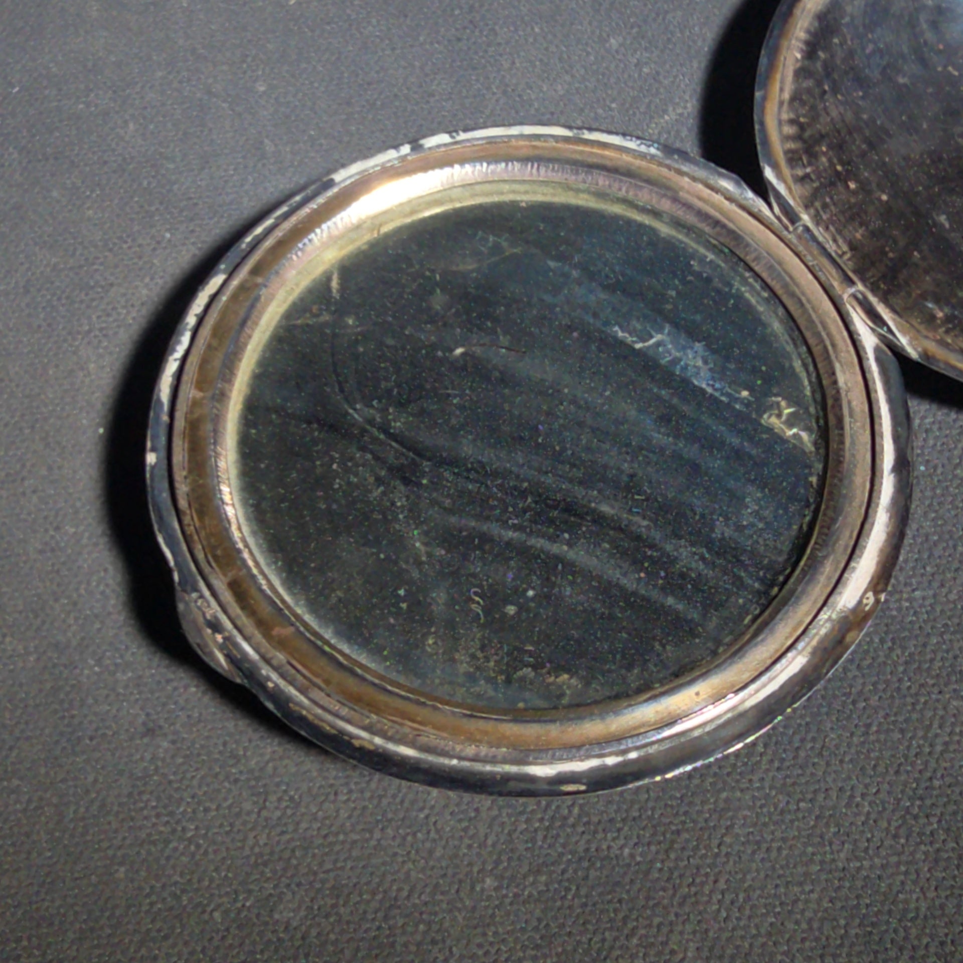 Antique Silver-Plated Compact with Engraved Floral Design and Interior Mirror