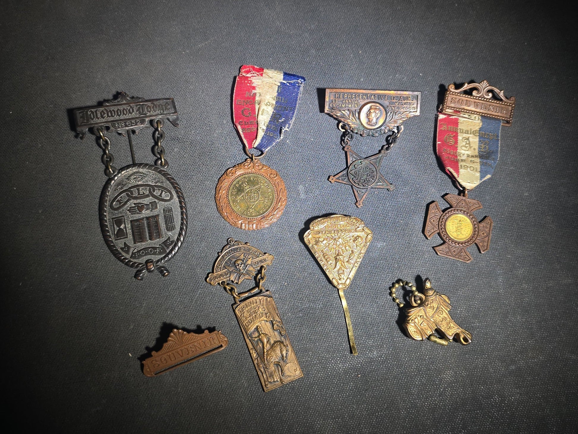 Grouping of Eight Antique Fraternal and G.A.R. Medals, Badges, and Accessories including I.O.O.F. Idlewool Lodge No. 652, Knights of Pythias Trinity Commandery Augusta, Maine, and G.A.R. Encampment Souvenir Badges