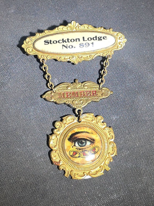 Antique Independent Order of Odd Fellows I.O.O.F. Stockton Lodge No. 891 Member Medal with All-Seeing Eye and F.L.T. Chain Links, Manufactured by The M.C. Lilley & Co., Columbus, Ohio
