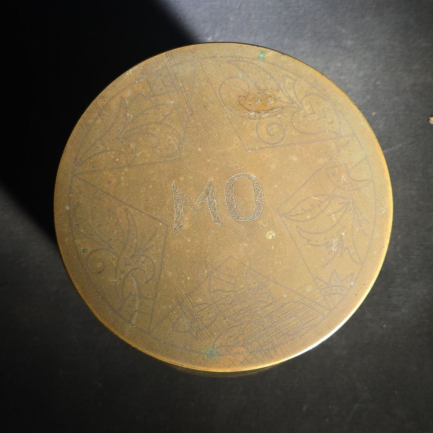 Antique WWI Trench Art Brass Lidded Box with Hand-Engraved Star, Diamond, Leaf, and Scroll Decoration, "MO" Monogram, and Green Fabric-Lined Interior