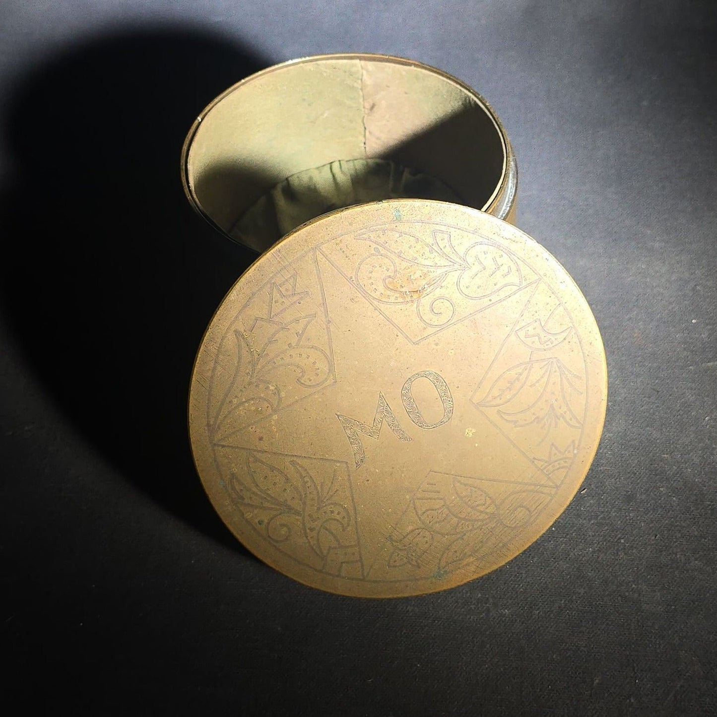 Antique WWI Trench Art Brass Lidded Box with Hand-Engraved Star, Diamond, Leaf, and Scroll Decoration, "MO" Monogram, and Green Fabric-Lined Interior