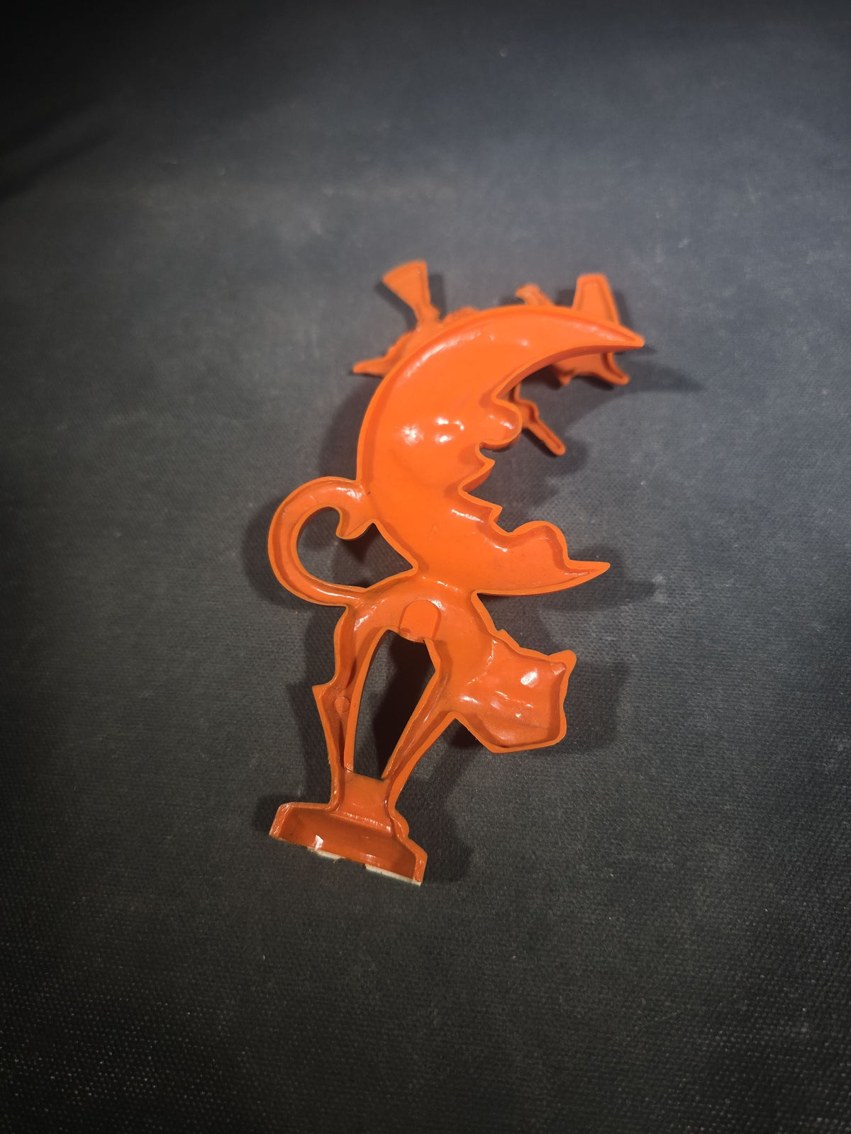 Grouping of Three Vintage Halloween Items including Tin Lithograph Ratchet Noisemaker with Jack-O-Lantern, Black Cat, and Witch Graphics, Manufactured by Kirchhof, Newark, New Jersey, and Two Witch on Crescent Moon and Black Cat Figures