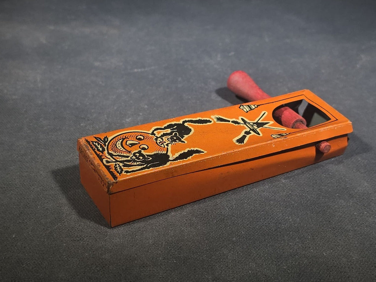 Grouping of Three Vintage Halloween Items including Tin Lithograph Ratchet Noisemaker with Jack-O-Lantern, Black Cat, and Witch Graphics, Manufactured by Kirchhof, Newark, New Jersey, and Two Witch on Crescent Moon and Black Cat Figures