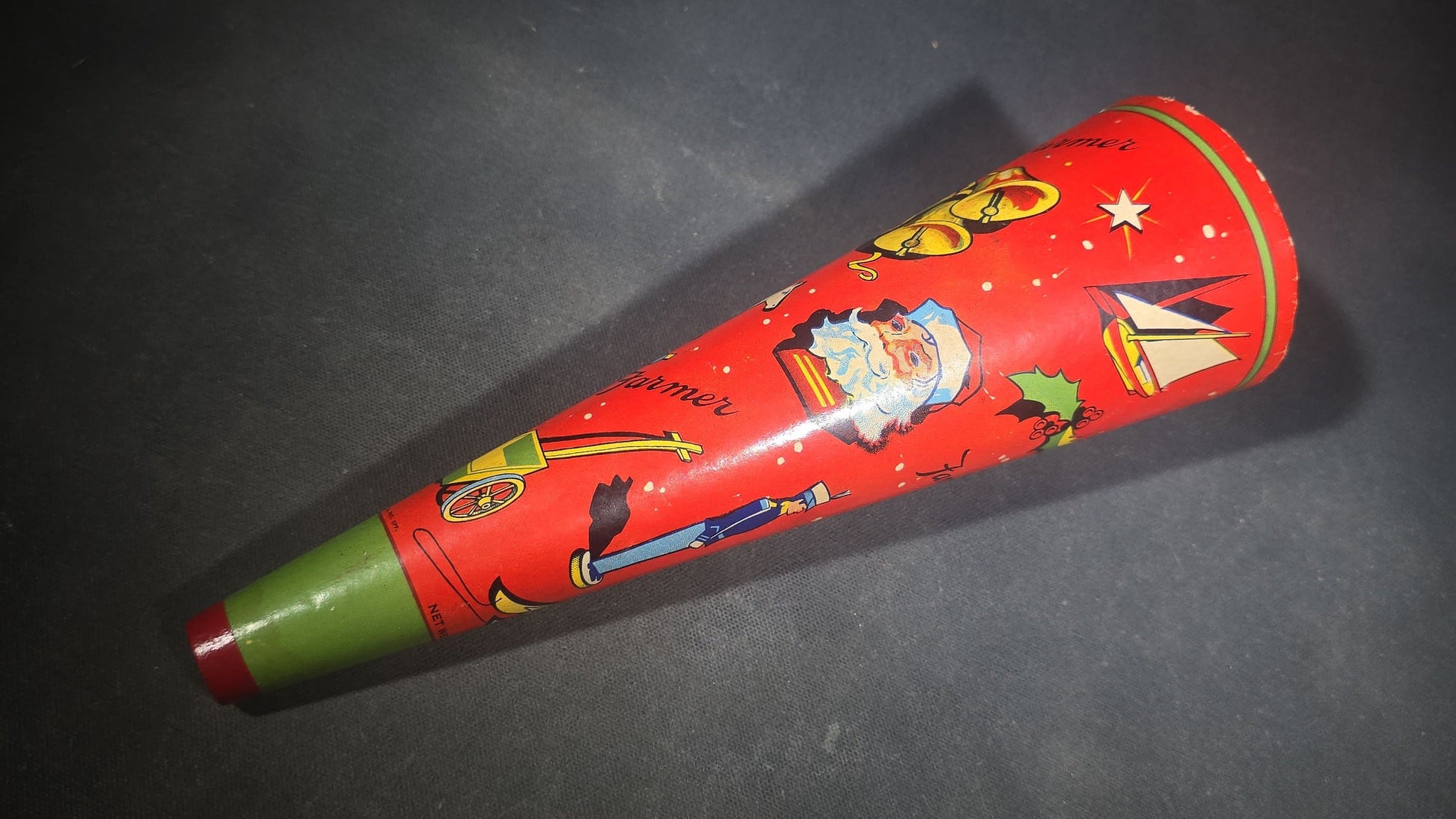 Vintage Tin Lithograph Christmas Horn Noisemaker with Santa Claus, Holly, Star, Sled, and Toy Graphics