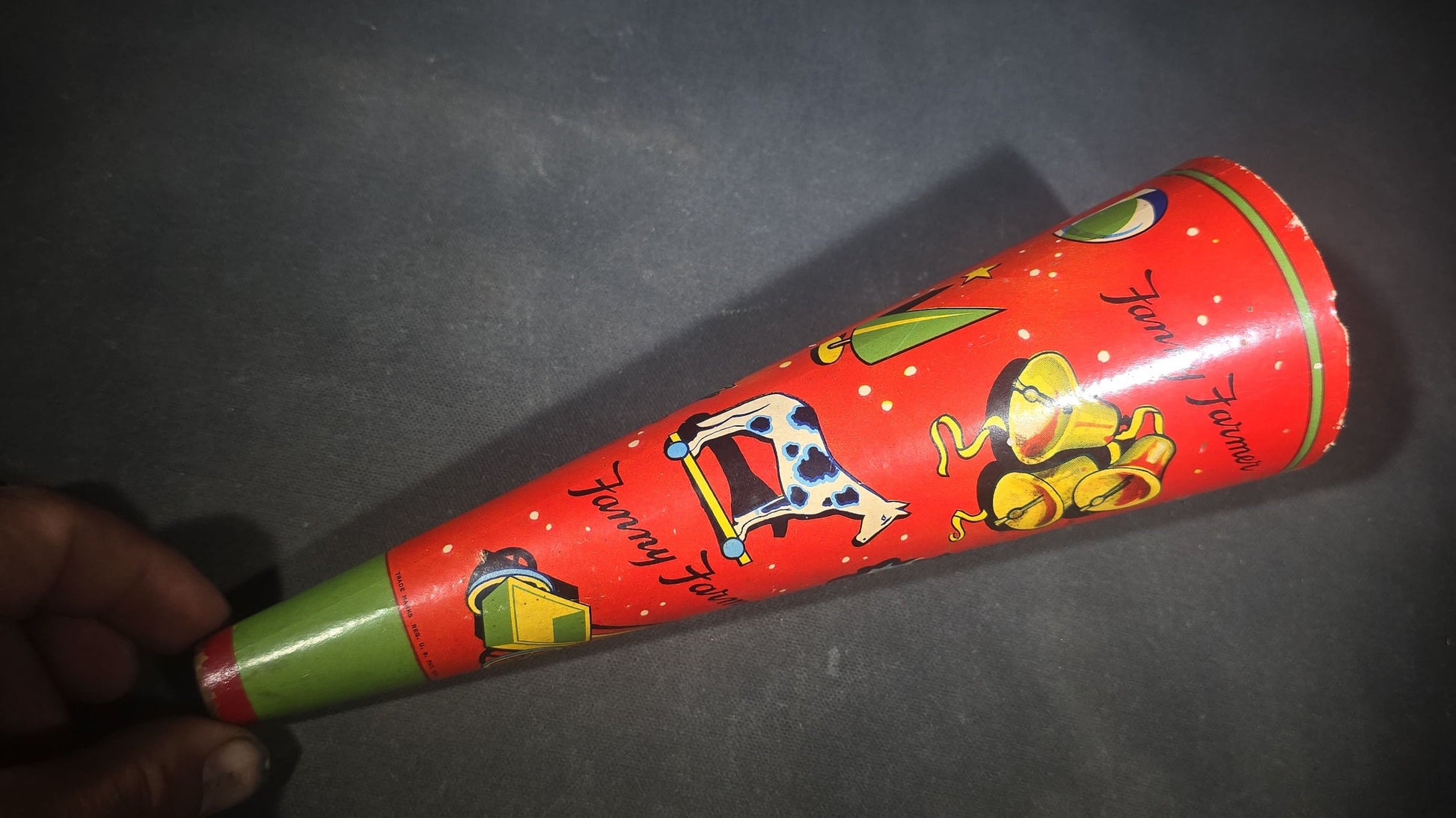 Vintage Tin Lithograph Christmas Horn Noisemaker with Santa Claus, Holly, Star, Sled, and Toy Graphics