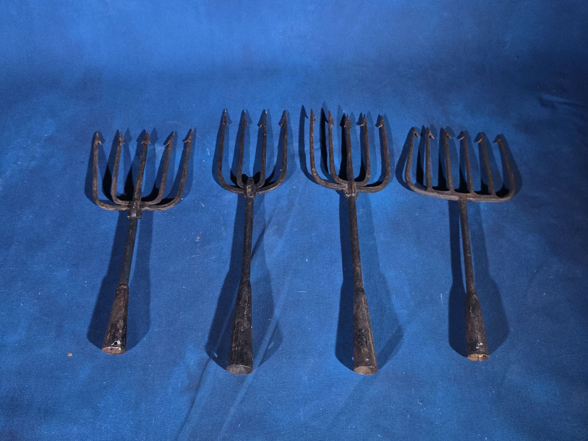 Grouping of Four Antique Iron Eel Spears