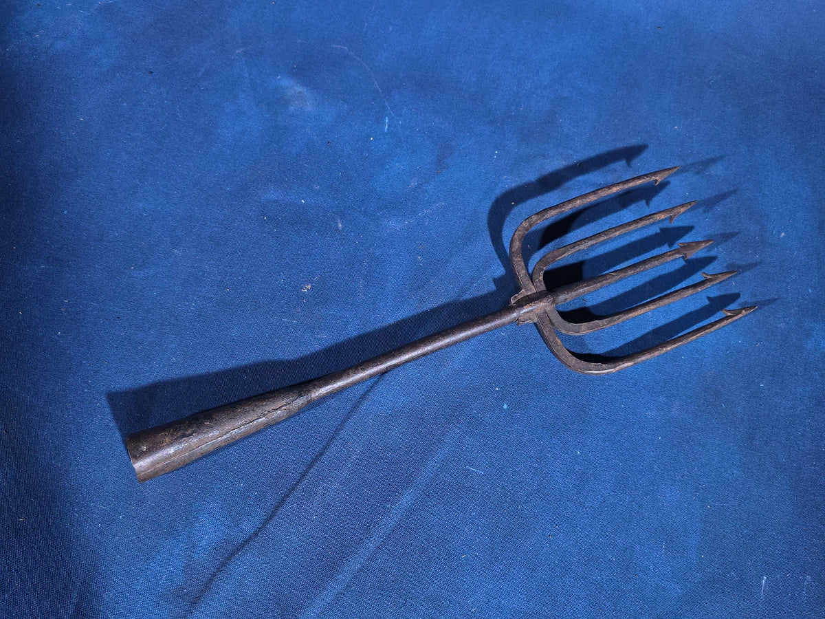 Grouping of Four Antique Iron Eel Spears