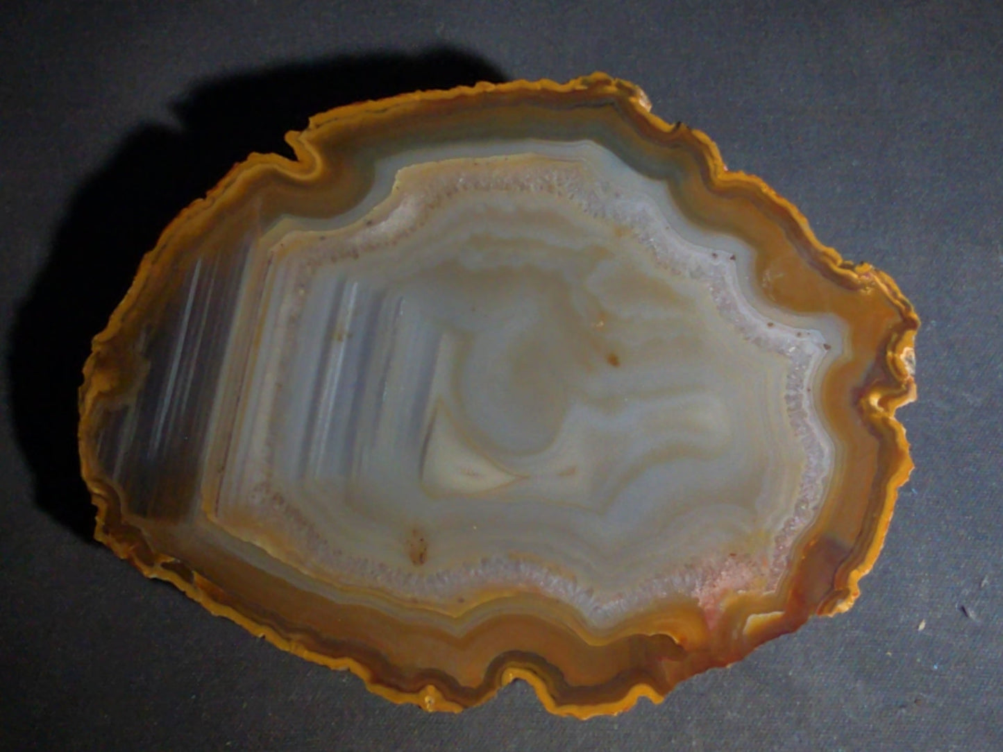 Grouping of Four Polished Agate Slices with Banded Patterns