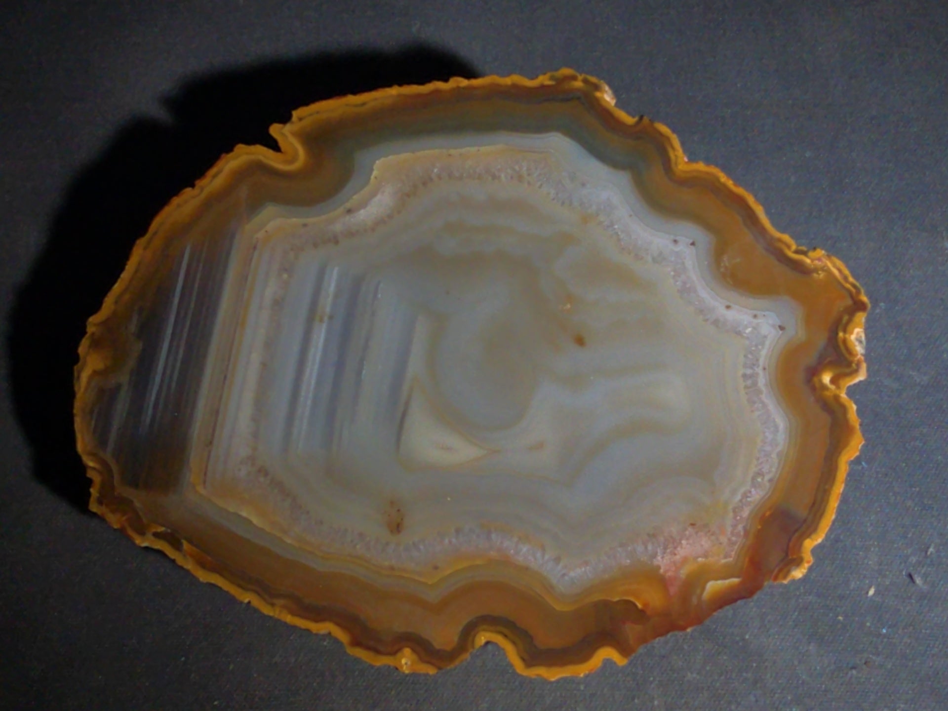 Grouping of Four Polished Agate Slices with Banded Patterns