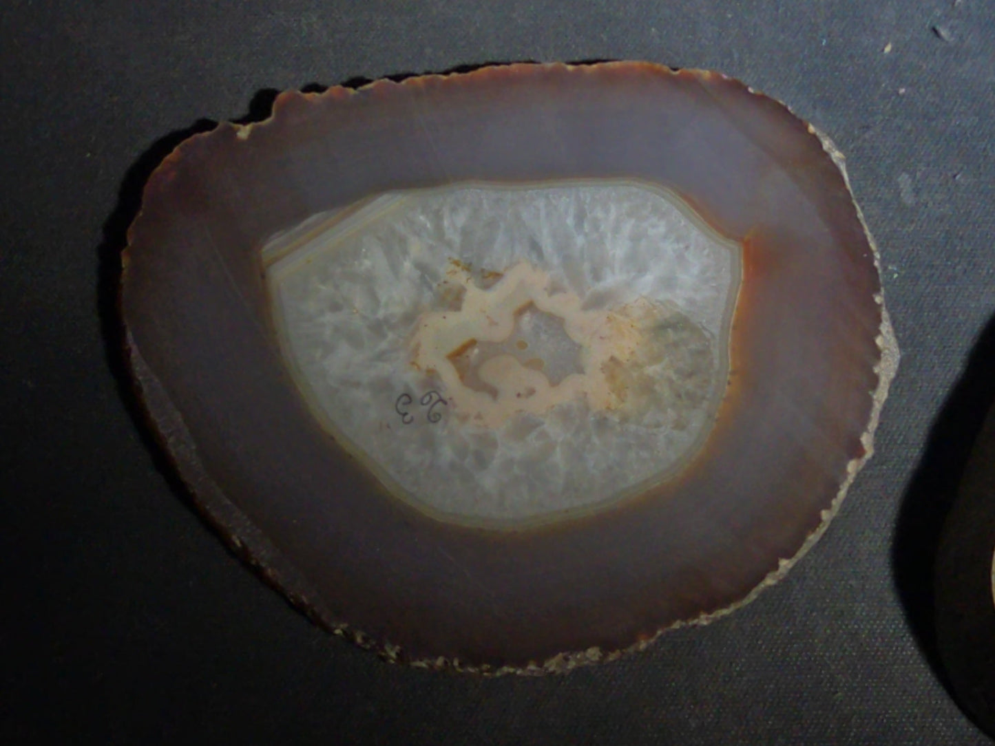 Grouping of Four Polished Agate Slices with Banded Patterns
