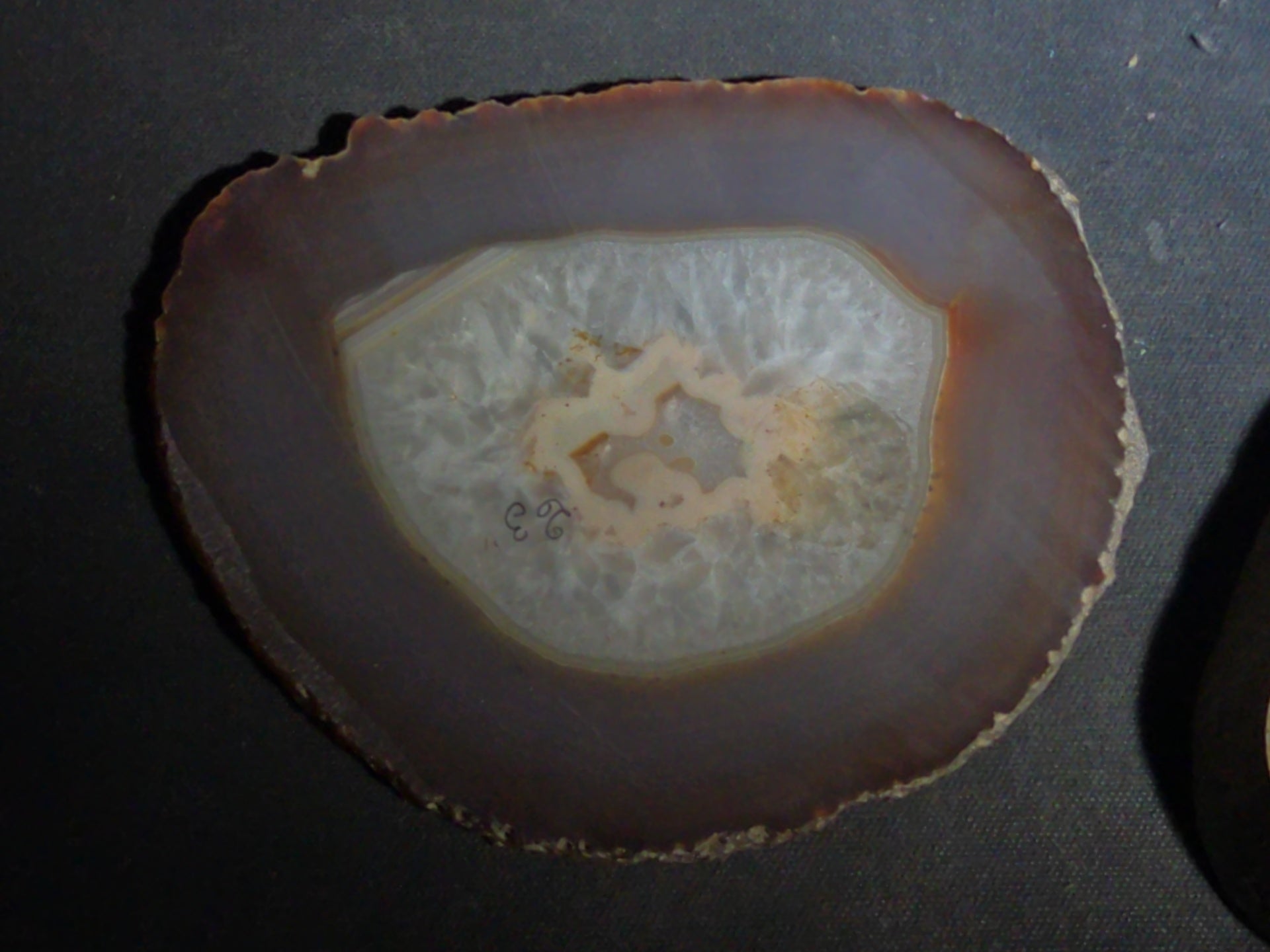 Grouping of Four Polished Agate Slices with Banded Patterns