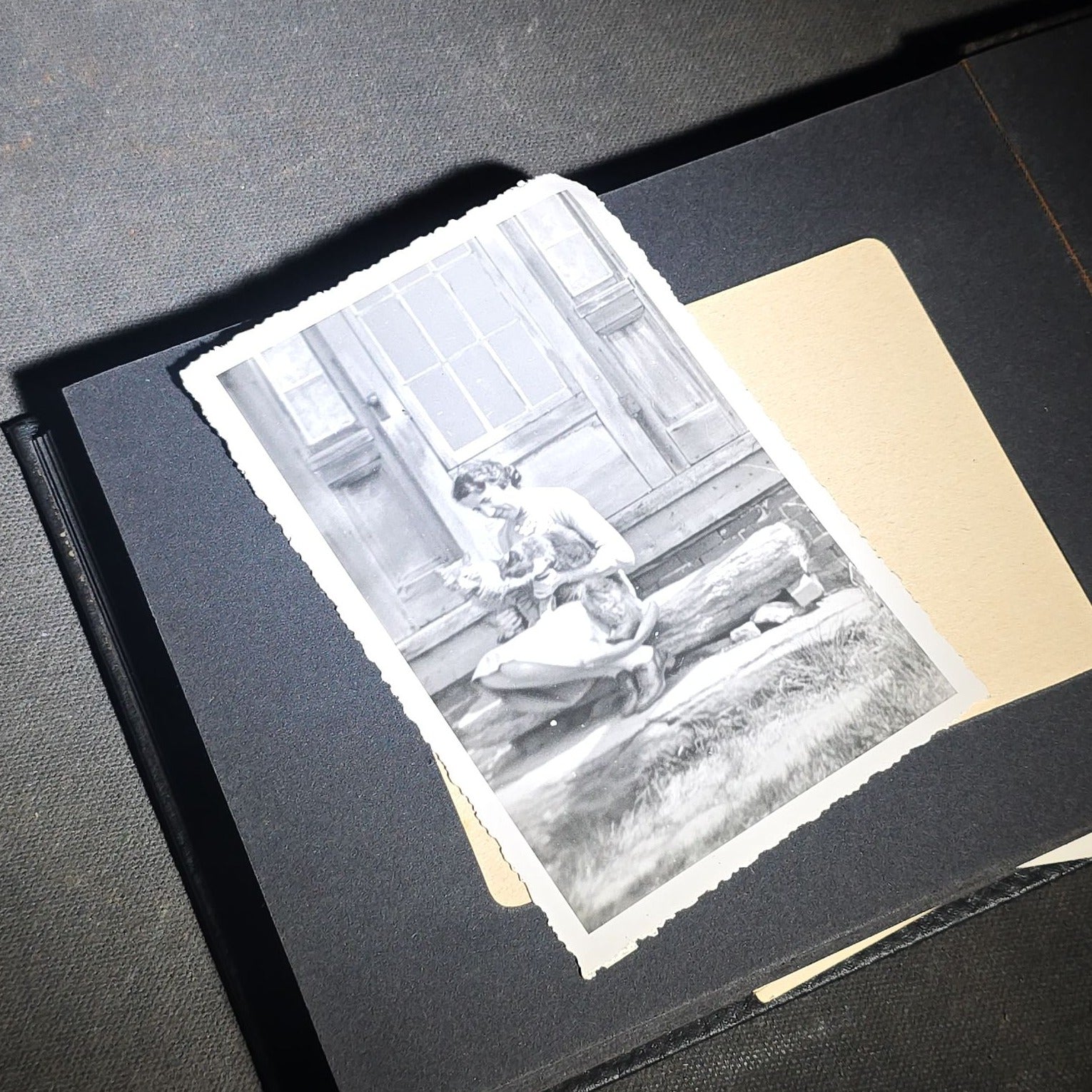 Vintage Photo Album Containing 30+ Snapshot Photographs including Soldier at Stonehenge, Cats, Military Subjects, and May Day