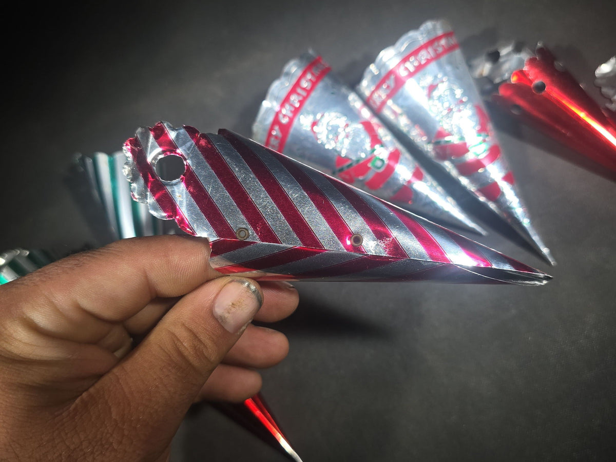 Grouping of Eight Vintage Metal Foil Christmas Candy Horn Ornaments including "Merry Christmas" Santa Claus Cones and Striped Varieties