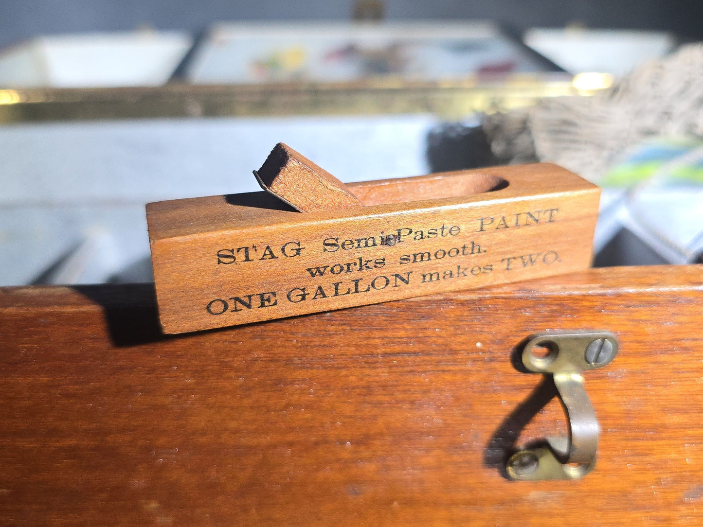 Vintage Wood Tackle Box with Fishing Tackle and Smalls including Creek Chub Bait Co. Injured Minnow Lure, Fly Fishing Flies, Baitcasting Reels, Leader Box, Fly Reel, and Stag Semi-Paste Paint Advertising Miniature Wood Plane