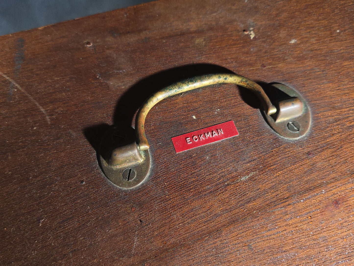 Vintage Wood Tackle Box with Fishing Tackle and Smalls including Creek Chub Bait Co. Injured Minnow Lure, Fly Fishing Flies, Baitcasting Reels, Leader Box, Fly Reel, and Stag Semi-Paste Paint Advertising Miniature Wood Plane