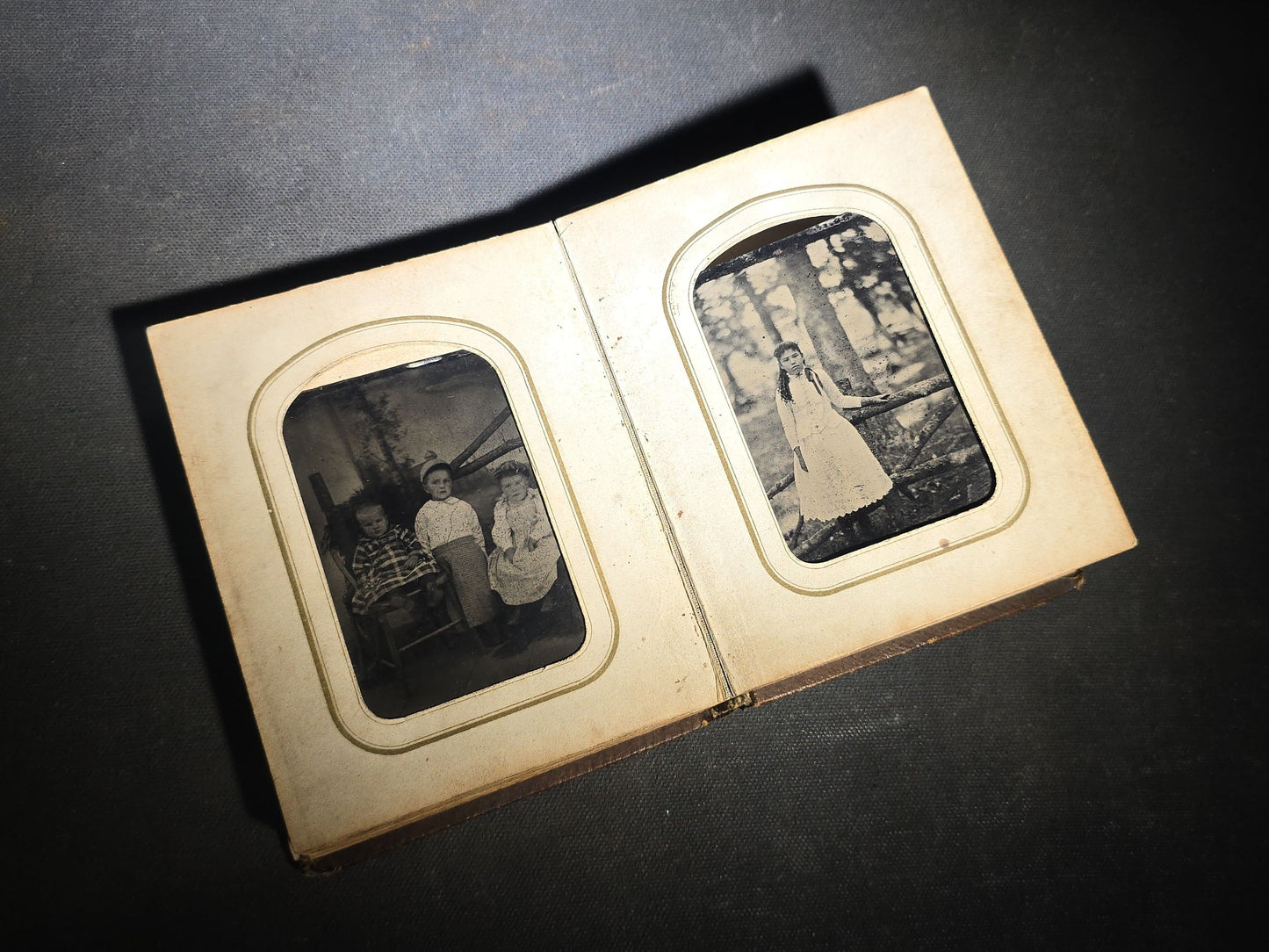 Antique Portrait Photo Album Containing Seven Tintype Photographs and Four C.D.V. Photographs, Embossed Leather Binding