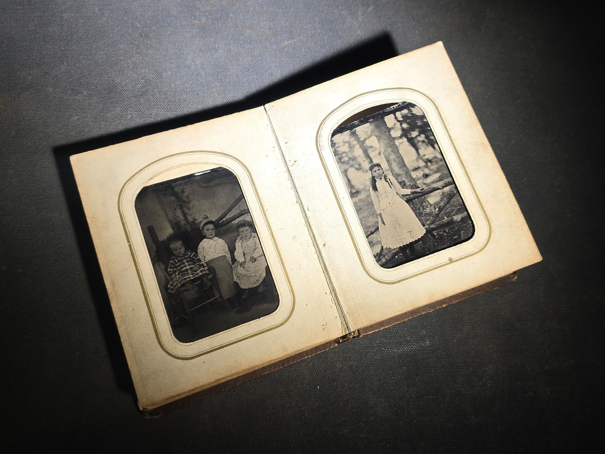 Antique Portrait Photo Album Containing Seven Tintype Photographs and Four C.D.V. Photographs, Embossed Leather Binding