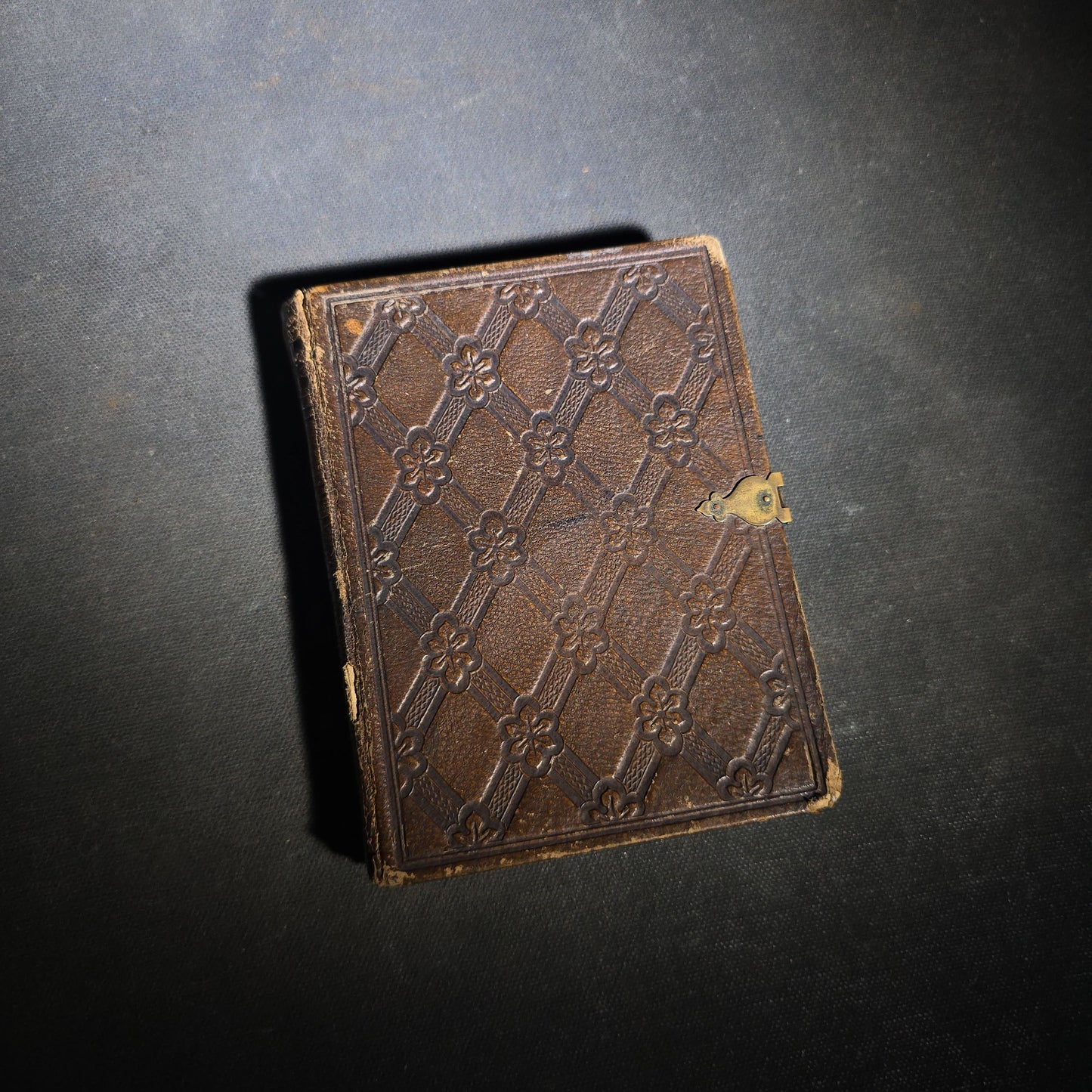 Antique Portrait Photo Album Containing Seven Tintype Photographs and Four C.D.V. Photographs, Embossed Leather Binding