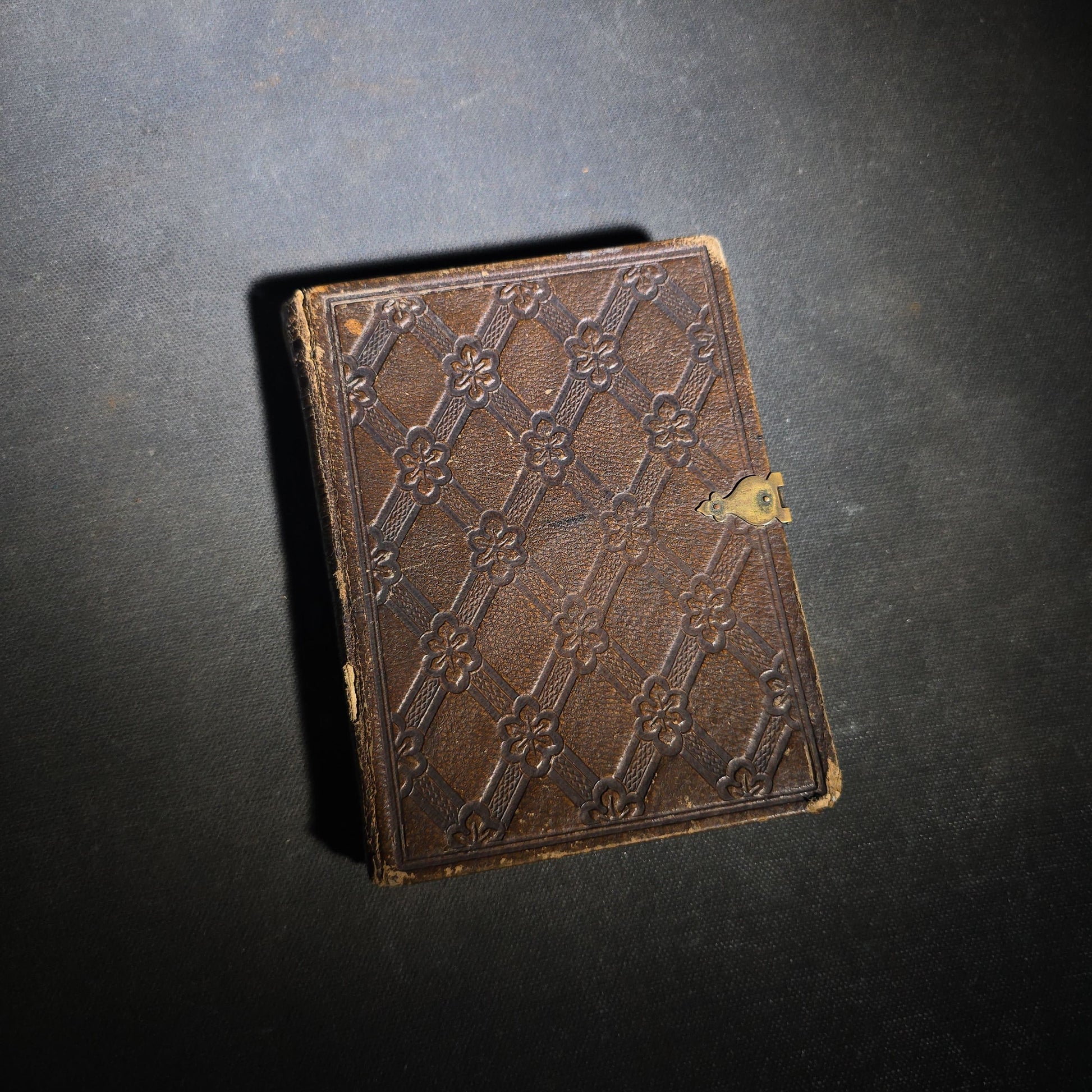 Antique Portrait Photo Album Containing Seven Tintype Photographs and Four C.D.V. Photographs, Embossed Leather Binding