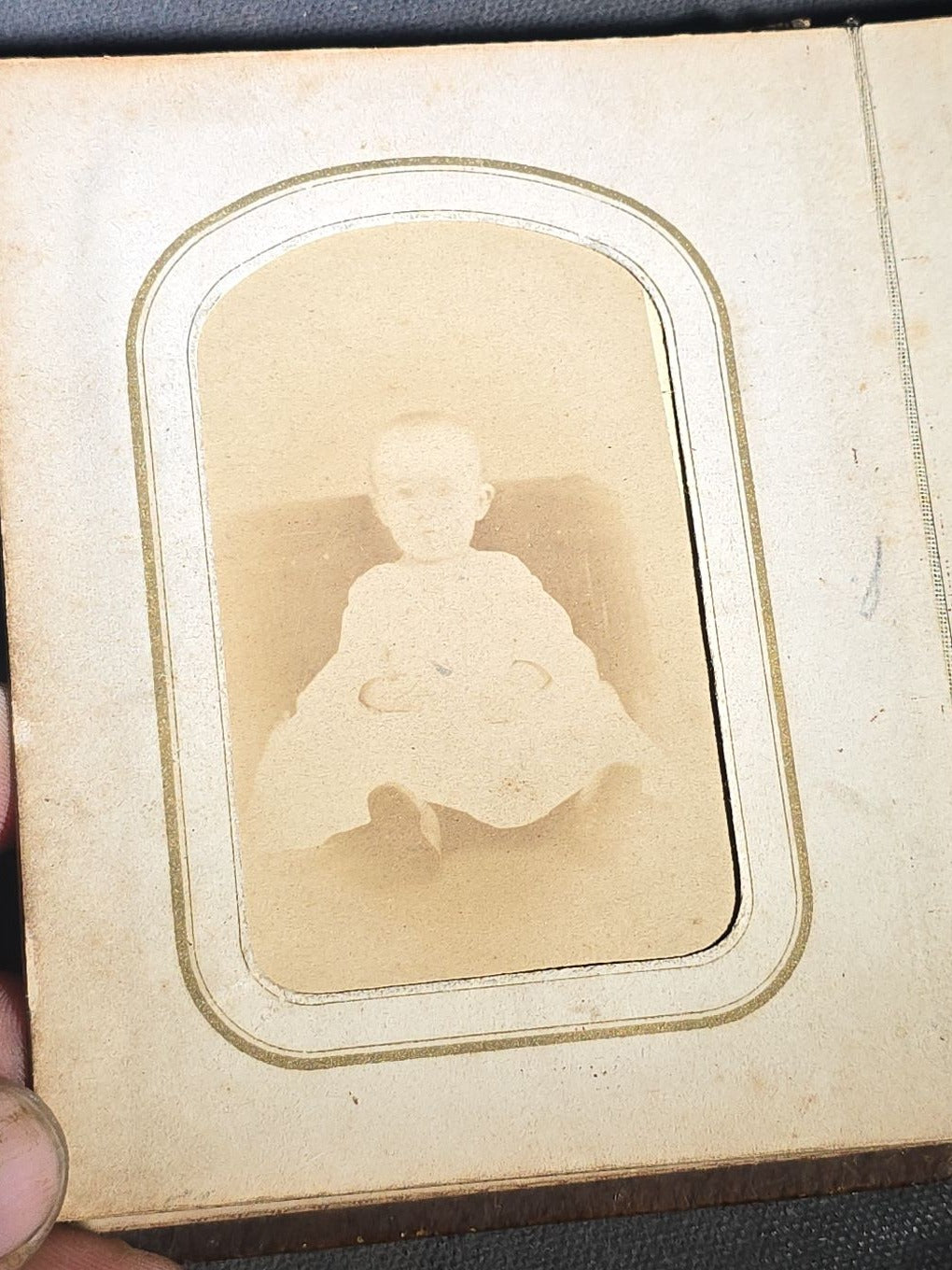 Antique Portrait Photo Album Containing Seven Tintype Photographs and Four C.D.V. Photographs, Embossed Leather Binding