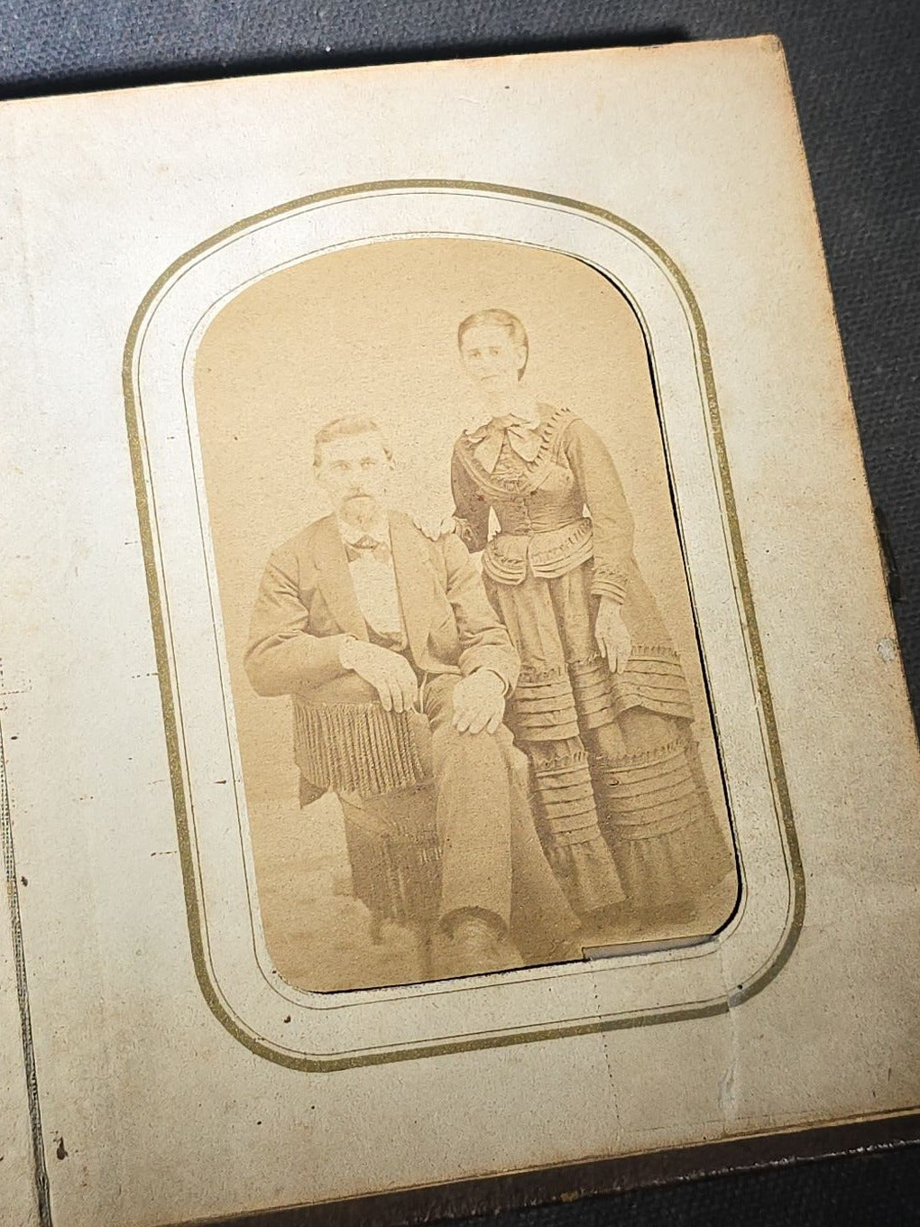 Antique Portrait Photo Album Containing Seven Tintype Photographs and Four C.D.V. Photographs, Embossed Leather Binding