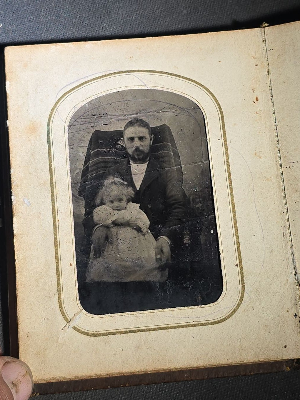 Antique Portrait Photo Album Containing Seven Tintype Photographs and Four C.D.V. Photographs, Embossed Leather Binding