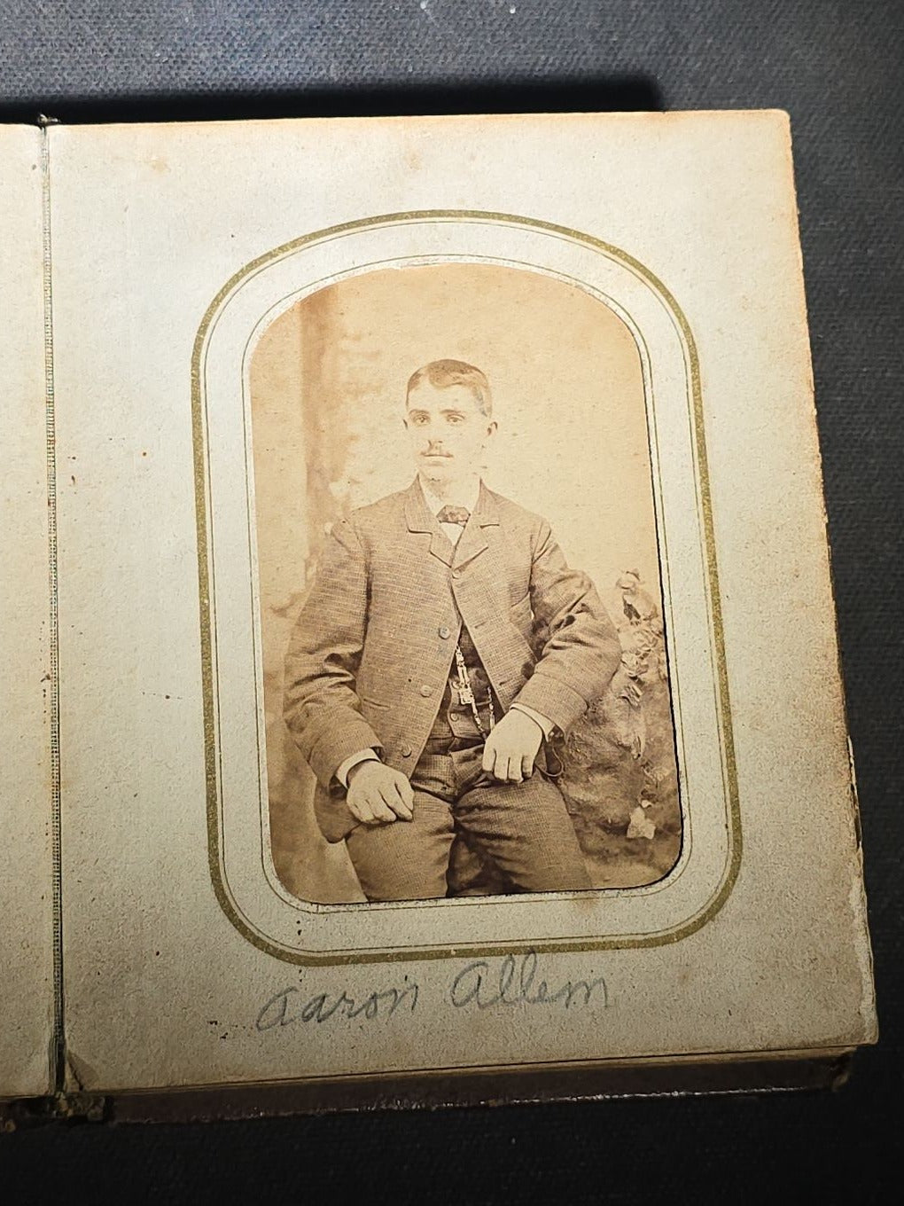 Antique Portrait Photo Album Containing Seven Tintype Photographs and Four C.D.V. Photographs, Embossed Leather Binding