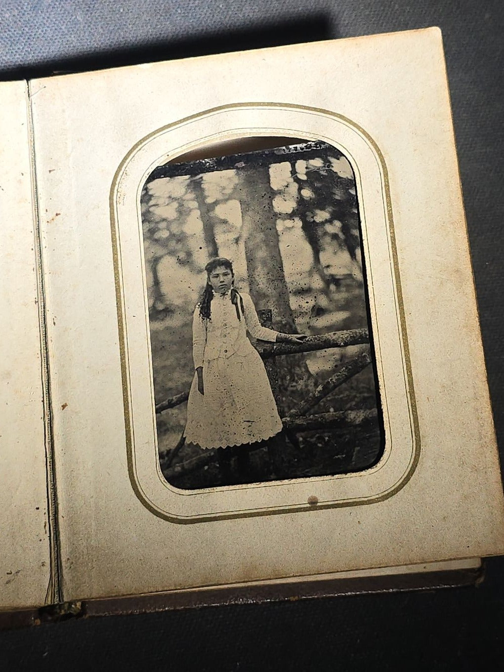 Antique Portrait Photo Album Containing Seven Tintype Photographs and Four C.D.V. Photographs, Embossed Leather Binding