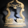 Lot 069 - Vintage Brass Figural Dolphin Ship's Bell Stand with Flanking Sea Serpents, Missing Bell, 10" L x 12" H