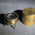 Lot 070 - Antique Brass Tripod Map Reader Loupe with Cylindrical Storage Canister, "Try Me" Trademark, Manufactured by J.P. Cutts, Sutton, & Son, Sheffield, England, Circa 1870, 2" W x 1-3/4" H