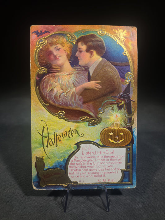 Antique Embossed Halloween Postcard with Couple Embracing, Jack-O-Lantern, Black Cat, and Bat, "Listen, Little One!" Verse Signed O. U. Kid, Halloween Series No. 6, Copyright E. Nash 1910, Unused
