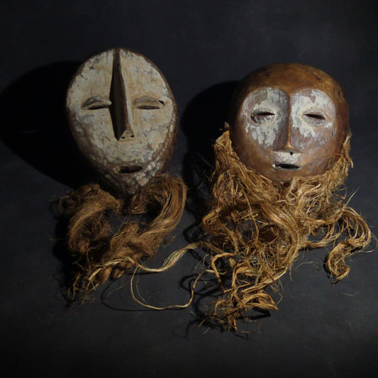 Pair of Vintage Lega Lukwakongo Carved Wood Masks with Raffia Beards, Democratic Republic of the Congo