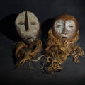 Lot 115 - Pair of Vintage Lega Lukwakongo Carved Wood Masks with Raffia Beards, Democratic Republic of the Congo