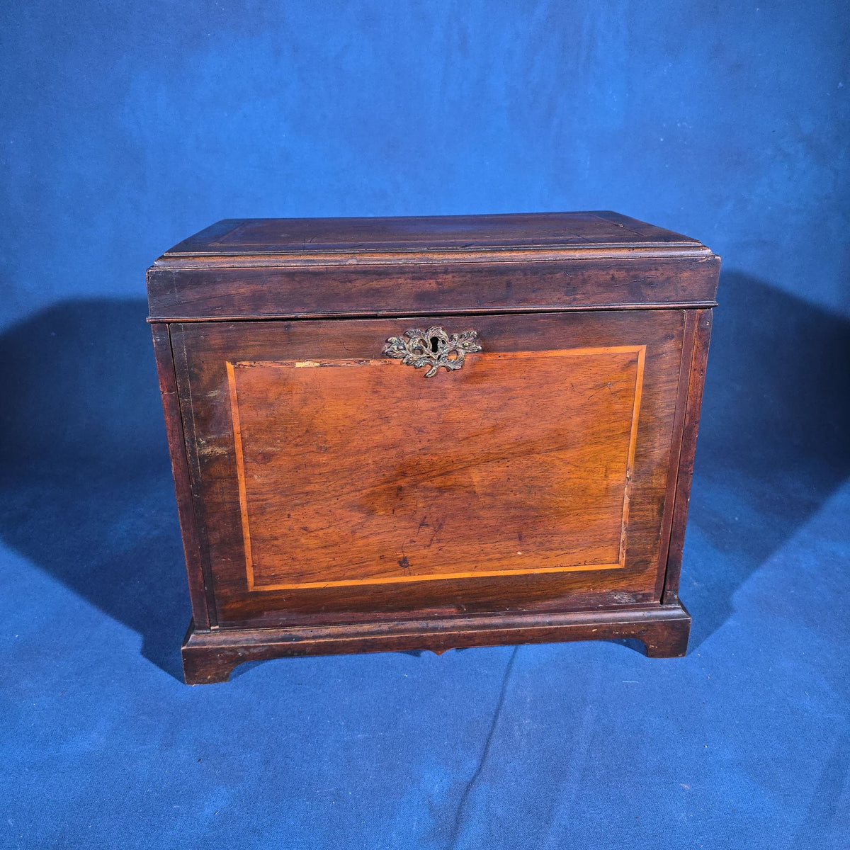 Antique Mahogany Collector's Cabinet with Silk-Lined Interior and Multiple Drawers