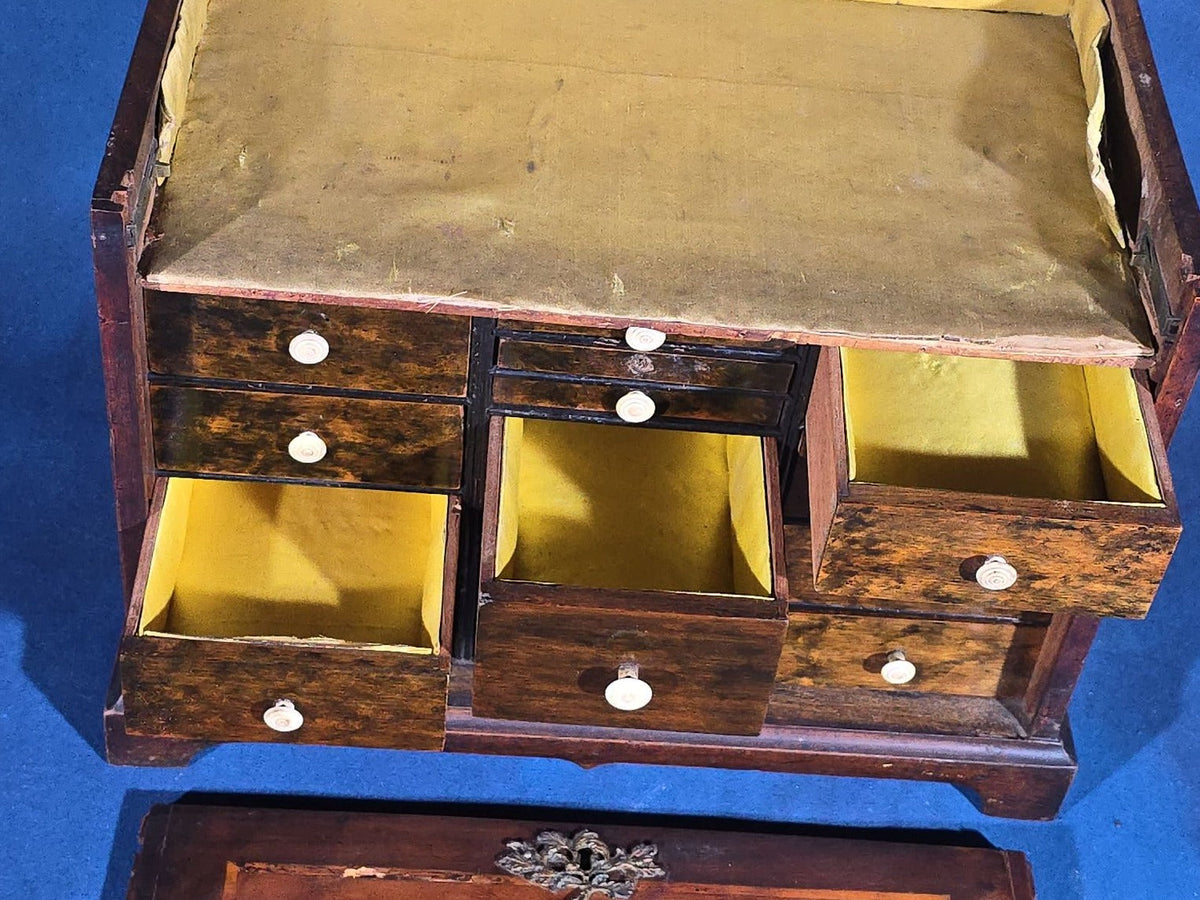 Antique Mahogany Collector's Cabinet with Silk-Lined Interior and Multiple Drawers